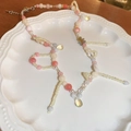 Colorful beaded necklace with pink and yellow charms on a white decorative plate - Imitation Pearl Colored Heart Bear Pendant Clavicle Chain