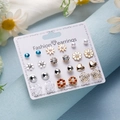 12 pairs of floral heart star and moon stud earrings set on a white display card - Floral Geometric Heart Gold Silver Red Blue Set (ER23Y0816-8)