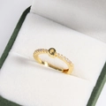 Close-up of 18k gold plated letter Q ring with clear crystals in a green jewelry box - Letter Q Gold