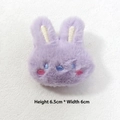 Detail of lavender plush rabbit brooch with embroidery showing 6.5x6cm dimensions - Purple