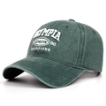 Close-up of dark green washed cotton baseball cap with white athletic embroidery - Dark Green