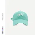 Mint green baseball cap with a decorative white pearl bow for women - M (56-58cm) / Mint Green