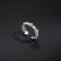 Detail of silver hollow flower ring with pavé zircons and adjustable open band - Exquisite Flower Zirconia Style (Style 4)