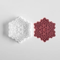 White plastic snowflake cookie cutter with a 3D embossed red-brown biscuit result - E-791 Snowflake F
