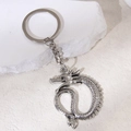 Porte-clés dragon vintage en métal argenté avec pendentif sculpté et anneau rond - Style Dragon Argent
