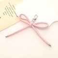 Pink faux leather bow keychain with heart pendant and metallic clasp for bags - Leather Bow Charm / Light Pink