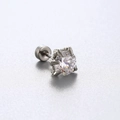 Silver claw-set ear stud with a large round transparent zircon and a flat back closure - White