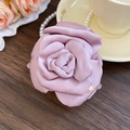 Detail of dusty pink satin rose hair claw clip with golden heart on wooden background - Dusty Pink