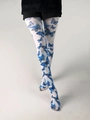 Close-up of white sheer pantyhose with detailed blue butterfly patterns on leg - 1826 Blue Large Butterfly