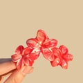 Elegant red marble textured floral hair claw clip featuring a three-flower design - 9cm Red (Marble Pattern)