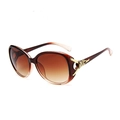 Chic women's oversized sunglasses with brown gradient lenses and gold metal accents - Tea with Fox Emblem