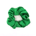 Lustrous emerald green satin scrunchie with smooth silk texture on white background - Emerald Green
