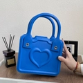 Chic bright blue EVA tote bag featuring a textured 3D heart embossed pattern and double handles - Blue