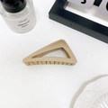 Matte beige triangular hair claw clip for elegant updo hairstyles in a minimalist style - Light Coffee