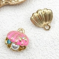 Pink enamel open shell charm with pearl and blue rhinestone in golden finish - Rose Red Rhinestone Pearl Scallop