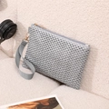 Grey hollow knit crochet wristlet bag with V-shaped texture and zipper closure - Silver