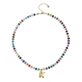 Bohemian colorful beaded necklace featuring a golden bubble letter K pendant - Letter R