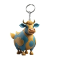 Detail of cartoon highland cow keychain in blue and yellow with metallic ring and chain - Blue And Yellow Color Block Cow Style