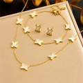 Detail of gold-plated necklace and bracelet set with white star-shaped shell inlays - Four-Pointed Star Style (N2928 B1452)