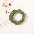 Detail of army green satin scrunchie with silky pleated fabric texture and elegant sheen - Satin Thin Scrunchie-Fruit Green