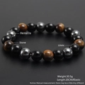 Detail view of 10mm tiger eye beaded bracelet with hematite stone and product dimensions - 10mm