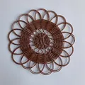 Bohemian style dark brown woven round wall decor with intricate hollow flower pattern - E20 Hollow Center Style (30cm)