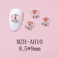 Macro shot of silver heart crown nail charms with red marquise stones and white rhinestones - Silver Base Red Rhinestone (AH10)