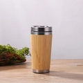 Vacuum insulated bamboo coffee mug with stainless steel interior on wooden desk - 450ml Car Mug with Steel Lid