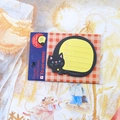 Cute black cat shaped animal sticky notes with to-do list and red checkered card - Cat