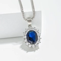 Collier tournesol en argent avec saphir bleu ovale et cristaux de halo en zircon blanc - Collier En Zircon Bleu Mer Or Blanc