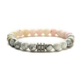 Detail of white turquoise beaded bracelet with marble texture and silver spacer beads - Pink Natural Stone