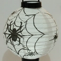 Spherical white paper Halloween lantern featuring black spider and spider web patterns - White Spider Glowing Lantern