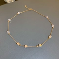 Elegant gold titanium necklace with rainbow crystal cubes and adjustable chain length - Gold Necklace