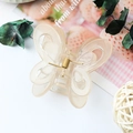 Elegant beige butterfly claw clip made of translucent acrylic with a metal spring - Jelly Beige