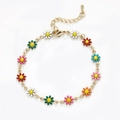 Detail of gold chain bracelet with colorful daisy charms, lobster clasp and extension chain - Colorful Small Daisy Pendant Bracelet (BC491-11)