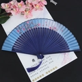 Blue folding fan with pink plum blossoms, butterflies and decorative silk tassel - Cherry Pink Blue White Blue Handle
