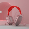 Pink wireless over-ear headphones with red silicone headband and modern soft matte finish - Micro-USB Charging Port / Red
