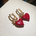 Detailed macro view of red heart drop earrings with gold finish and sparkling zircon accents - Red Heart Snowflake Pendant Style (3#)