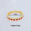 Bracelet élastique doré à la mode avec breloques en émail cerise rouge pesant 20g - Cerise en Émail