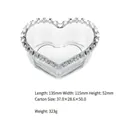 Detailed view of a transparent heart-shaped glass bowl with beaded rim 135x115x52mm size - Clear