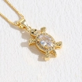 Elegante collar de tortuga marina bañada en oro de 14 quilates con circón ovalado - Circonita Blanca