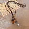 Boheemse retro vlinderketting met bruin leren koord, metalen veren en turquoise kralen - 1# Zilveren veer