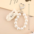 Detail of 10cm white plush teddy bear keychain with pearl strap and heart charm - White Bear