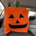 Halloween pumpkin car headrest cover with Jack-o'-lantern face in orange felt fabric - Orange Pumpkin Chair Cover