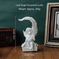 Leaf angel resin sculpture in white seated on books, 18cm height decorative ornament - Leaf Angel Figurine (Left)