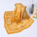 Detail of mustard yellow silk square scarf with white paisley and floral patterns - Gold Paisley