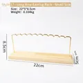 Small metal earring display stand with golden wave hooks and natural wood base - Long Row Earring Stand - Small