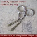 Bronze finish calligraphy brush keychain in zinc alloy with success wishes engraving - Multi-size / Success Pen