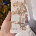 Detailed view of rhinestone pearl hair clips set featuring elegant bow and geometric designs - Bowknot 4-piece Set