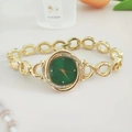 Elegant gold chain watch for women featuring a green square dial and sparkling rhinestones - Gold Color Green